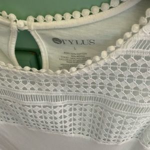 White shirt with lace accent.